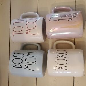 Rae Dunn Assorted Mugs in Gray, Blue, Pink, and White. Set Of 4